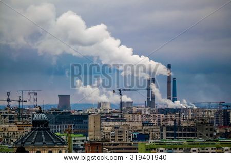 Bucharest, Romania - February 12, 2019: The Chimneys Of The Cet Sud Power Plant, Which Pollute With 
