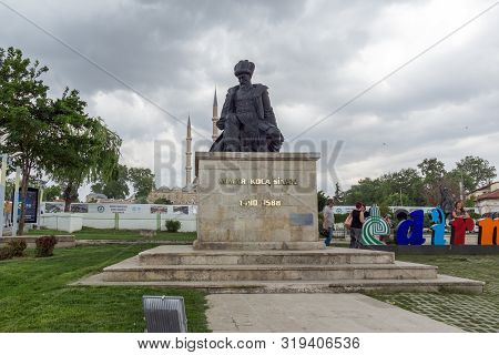 Edirne, Turkey - May 26, 2018: Monument Of Ottoman Architect Mimar Sinan And Selimiye Mosque  In Cit