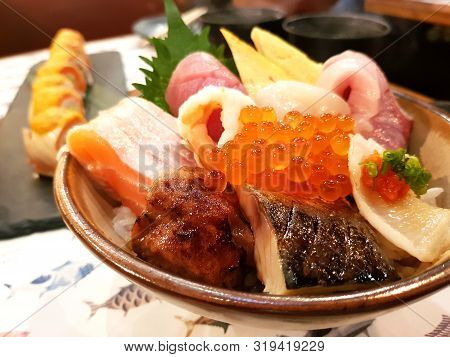 Kaisendon Sushi Don On Rice With Wood Background