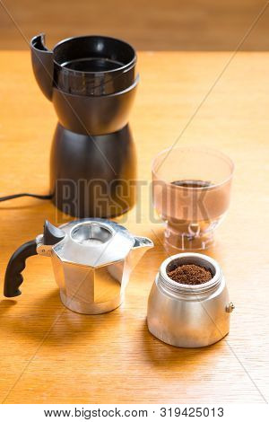 Moka Pot And Coffee Beans And Grinder.