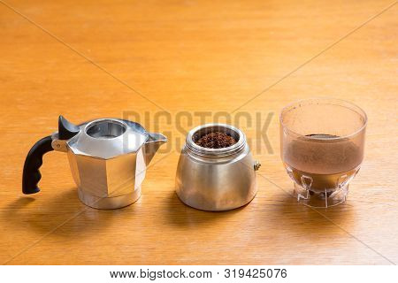 Moka Pot And Coffee Beans And Grinder.