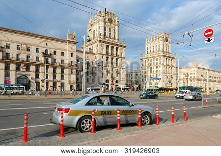 Minsk, Belarus - August 12, 2019: Unidentified People Go On Privokzalnaya Square. Architectural Comp