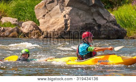 Myhiya, Ukraine - August 17, 2019: Playboating. Kayaking Freestyle On Whitewater. During Training, T