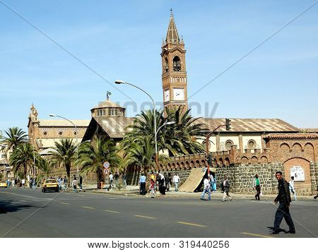 Eritrea, Africa - 08/10/2019: An Amazing Caption Of The Trees, Mountains And Some Old Typical Houses