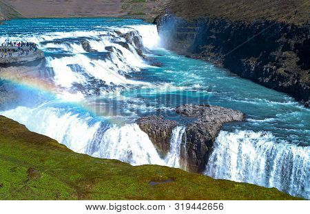 Gullfoss, Iceland, Golden Ring Area,  View Of The Gullfoss Waterfalls With Visitors On The Left