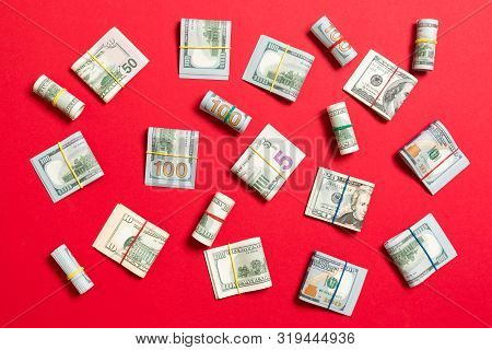 Colored Background With Money American Hundred Dollar Bills On Top Wiev With Copy Space For Your Tex