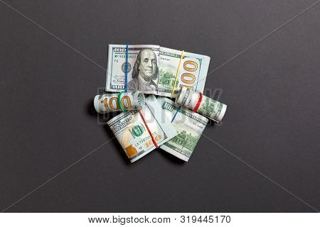 Us Dollar Bills Bundles Stack. One Hundred Dollar Bills With Stack Of Money In The Middle. Top View 