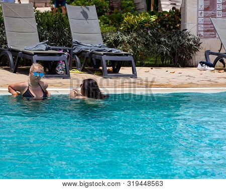 Dominican Republic, Bayaibe, Catalonia Gran Dominicus Hotel - 09 June 2019: Young Women Swimming In 