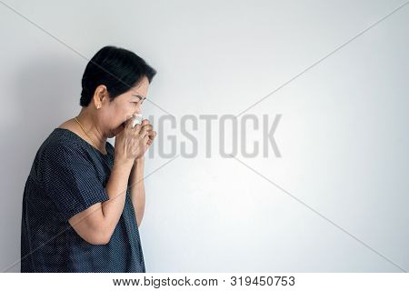 Flu Senior Asian Woman And Using Tissue Paper,elderly Female Sneezing,copy Space For Text On White B