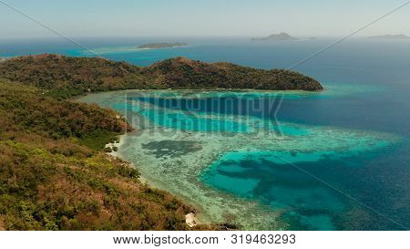 Aerial Seascape Tropical Beach With White Sand And Clear Blue Sea. Tropical Landscape With Islands A