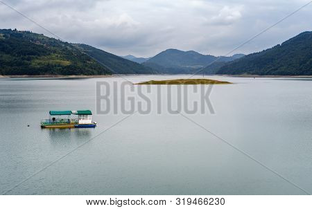 Zlatar Lake (zlatarsko Jezero) Summer Cloudy View With Cross On Small Islet, Serbia.