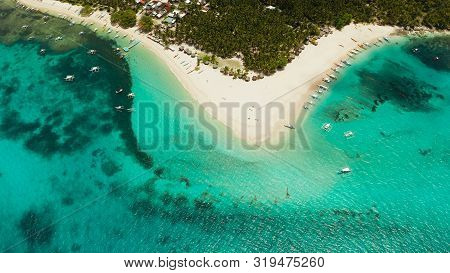 Beach With Tourists And Boats On A Tropical Island, Clear Blue Water. Daco Island, Philippines. Summ