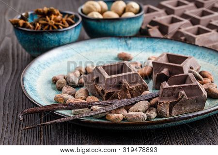 Chocolate With Vanila And Cocoa Beans Close Up