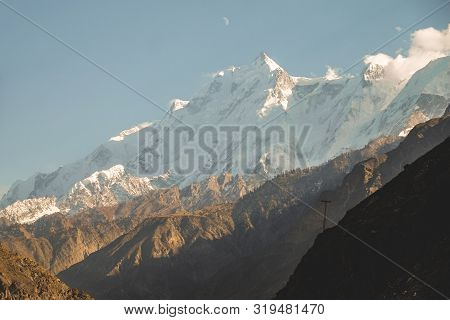 Close Up View Of Snow Capped Rakaposhi Mountain In Karakoram Range In Nagar Valley. Gilgit Baltistan