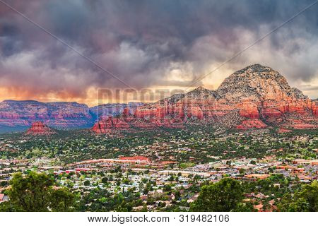 Sedona, Arizona, USA downtown cityscape and mountains.