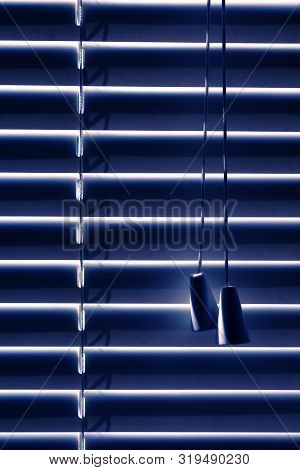 Closed Blinds, Located On The Window, Protect From The Sun During The Bright Day Or From The Neon Li