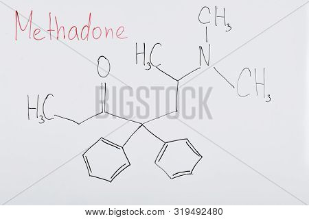 Top View Of White Board With Chemical Formula And Lettering Methadone