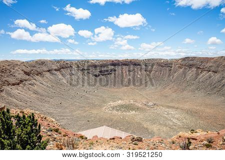 Meteor Crater, Blue Sky Background, Winslow Arizona, Usa.