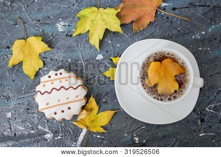 Autumn Still Life. Cup Of Tea With Maple Autumn Leaves And Inscription Hello Autumn On The White Bac