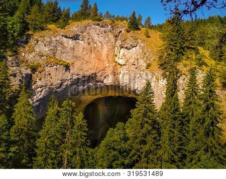 Chudnite Mostove Or Wonderful Bridges Natural Arches, Rhodope Mountains, Bulgaria. Sunset View