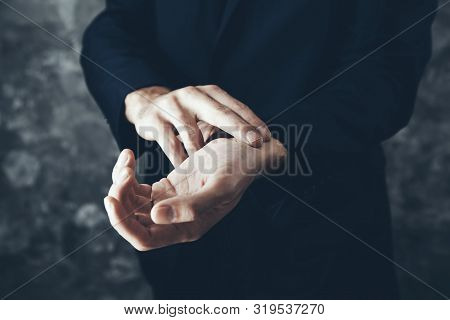 Man Hand In Puls On Gray Background