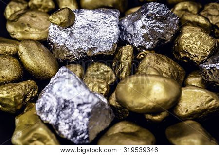 Gold And Silver Nuggets On Black Background. Precious Stones, Luxury Concept And Mineral Drainage. I