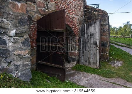 Old Wooden Gate To The Stone Watchtower Of Korela Fortress