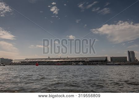 Amsterdam, The Netherlands - June 30, 2019: Terminal Hall Of Centraal Railway Station Seen From Ij W