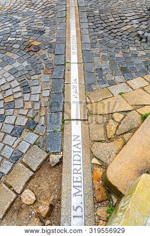 15th Meridian Line In Cobbled Street Of Jindrichuv Hradec, Czech Republic. Inscription 15. Polednik 
