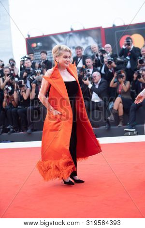 Catherine Deneuve  walks the red carpet ahead of the Opening Ceremony  during the 76th Venice Film Festival at Sala Grande on August 28, 2019 in Venice, Italy. 
