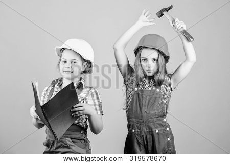 Happy Children. Future Career. Small Girls Repairing Together In Workshop. Labor Day 1 May. Little K