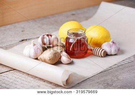 Ingredients For Healthy Tea With Herbs, Honey, Ginger, Garlic And Lemon, Seasonal Traditional Flu Re