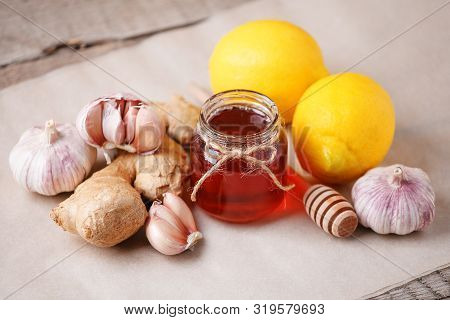 Homemade Antimicrobial Therapy. Ingredients For Healthy Tea With Herbs, Honey, Ginger, Garlic And Le