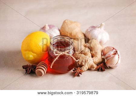Ingredients For Healthy Tea With Herbs, Honey, Ginger, Garlic And Lemon, Seasonal Traditional Flu Re