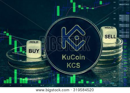 The Coin Cryptocurrency Kcs Kucoin Stack Of Coins And Dice. Exchange Chart To Buy, Sell, Hold.