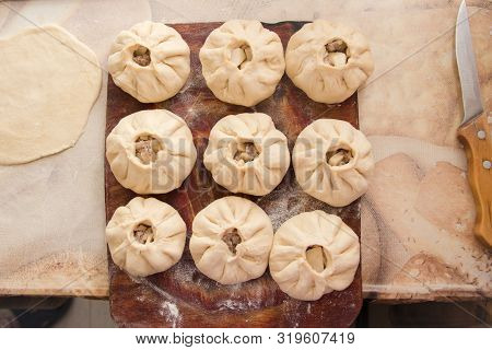 Vak Belyash - Bashkir National Cuisine, Homemade Meat Pies In White Bowl Over Wooden Background