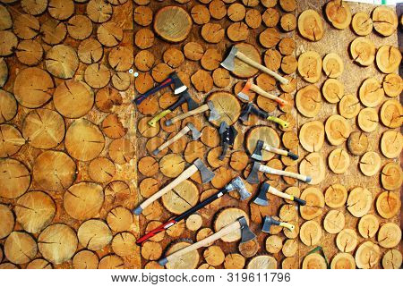 Rack With Wooden Circles And Axes Close Up