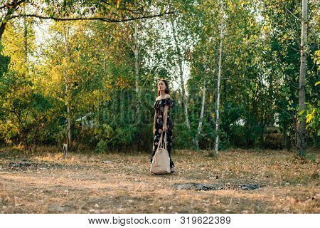 Caucasian Girl Holds Linen Shopper On Sunset Outdoors. Zero Waste Eco Friendly Conscious