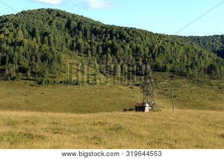 Altai Region, Russia - September 5, 2018:tv Tower Near The Taiga Village Of Generalka In The Mountai