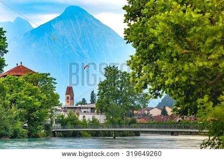Panoramic View Of Old City Of Unterseen With Church And Aare River, Interlaken, Important Tourist Ce