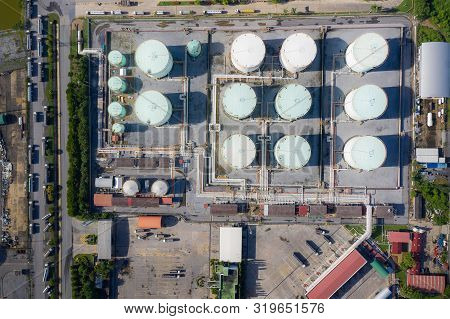 Aerial View Of Chemical Industry Storage Tank And Tanker Truck In Wailting In Industrial Plant To Tr