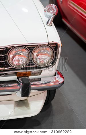 Close Up Color Detail On The Headlight Of A Vintage Car