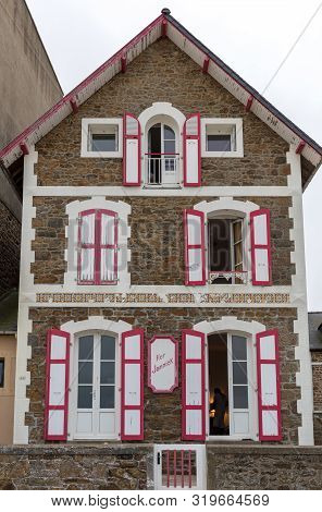 Saint-malo, France - September 12, 2018:  Front View Of Traditional Granite Houses Along The Promena