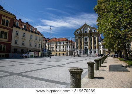 Ljubljana, Slovenia - August 15, 2019: Congress Square And The Ursulin Church Of The Holy Trinity In