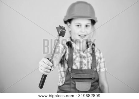 Foreman Inspector. Little Girl In Helmet With Hammer. Kid Worker In Hard Hat. Labor Day. 1 May. Repa