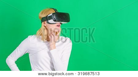 The Woman With Glasses Of Virtual Reality. Woman Using Vr Device. Cheerful Smiling Woman Looking In 