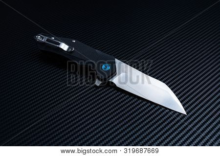 The Reverse Side Of The Knife. Clip On The Knife Handle. Polished Knife Blade.