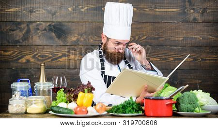 Cookery On My Mind. Improve Cooking Skill. Book Recipes. According To Recipe. Man Bearded Chef Cooki