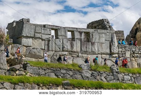 Machu Picchu, Peru - 05/21/2019: Temple Of The Three Windows At The  Inca Site Of Machu Picchu In Pe