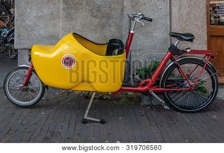 Amsterdam, The Netherlands - July 1, 2019: Closeup Of Parked Bakfiets, Front-trunk Bike To Transport